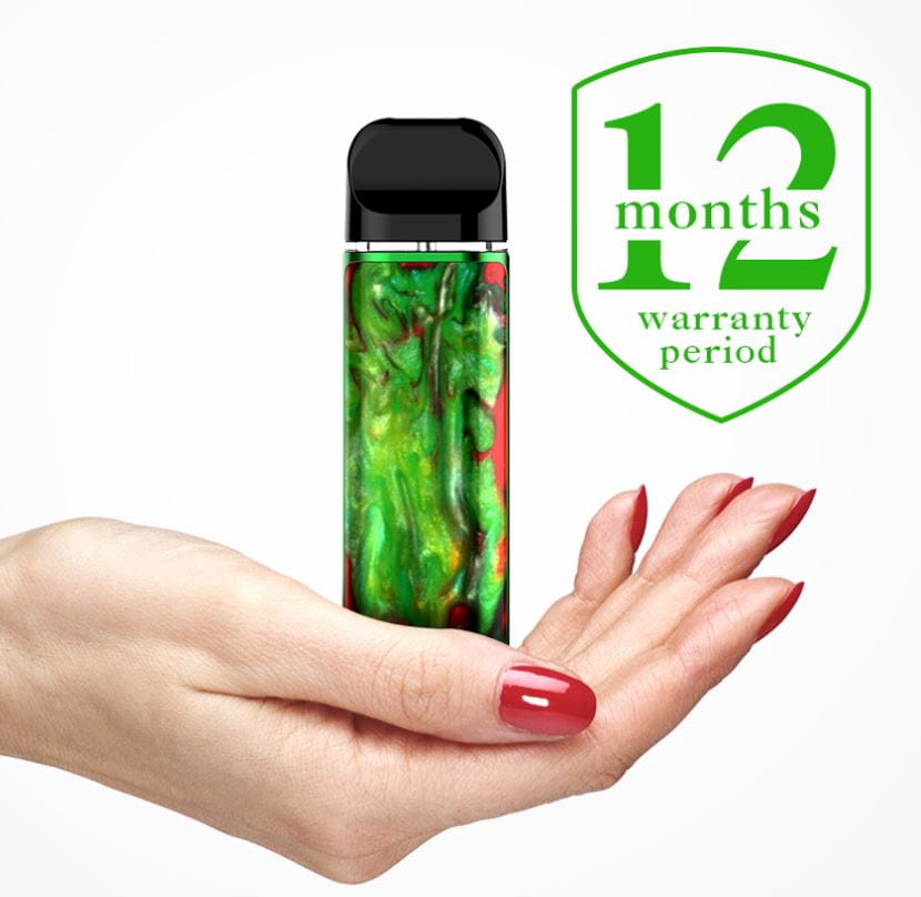 Smok Novo 2 25W Pod Kit in vibrant green and red pattern held in open hand