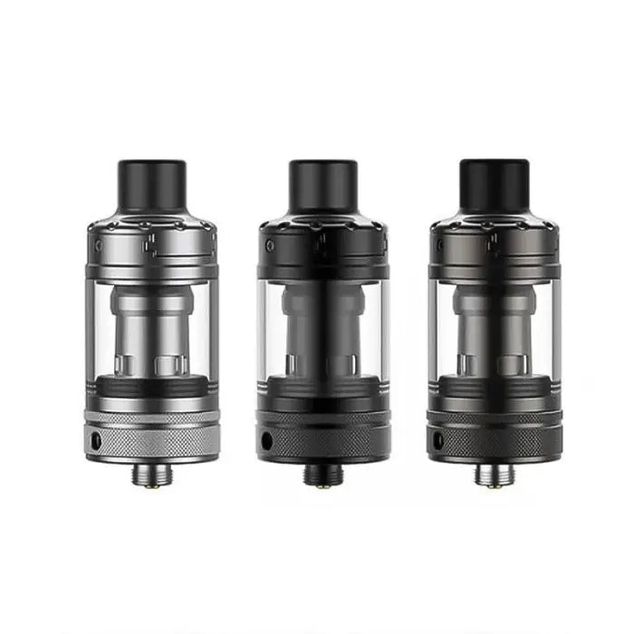 Three vaping tanks or atomizers in different metallic finishes.