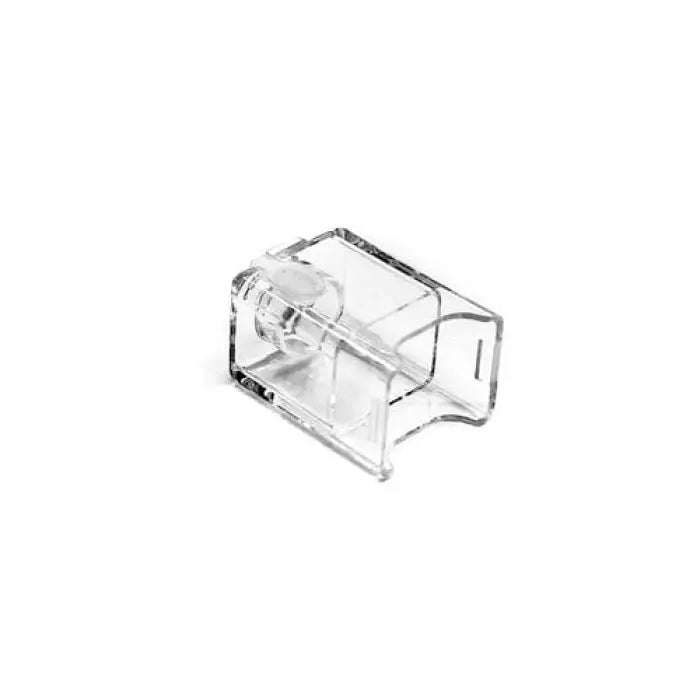 Clear plastic pencil sharpener with a cylindrical opening.