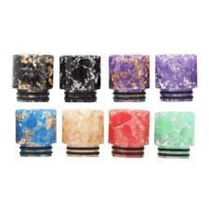 Colorful resin drip tips for vaping devices in various marbled patterns.