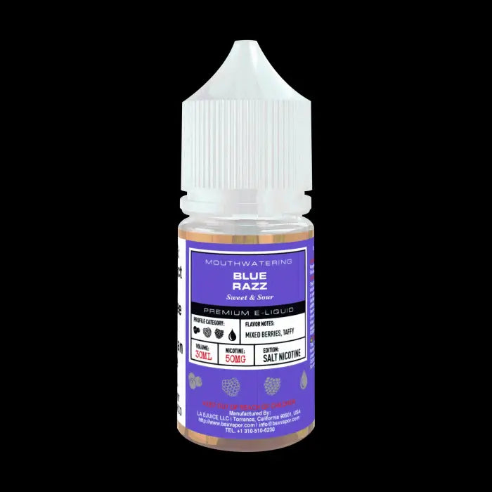 Bottle of e-liquid labeled ’Blue Razz’ with purple packaging and berry illustrations.