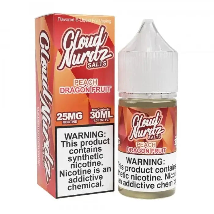 E-liquid bottle and packaging for ’Cloud Nurdz Salts’ in Peach Dragon Fruit flavor, with nicotine warning labels.