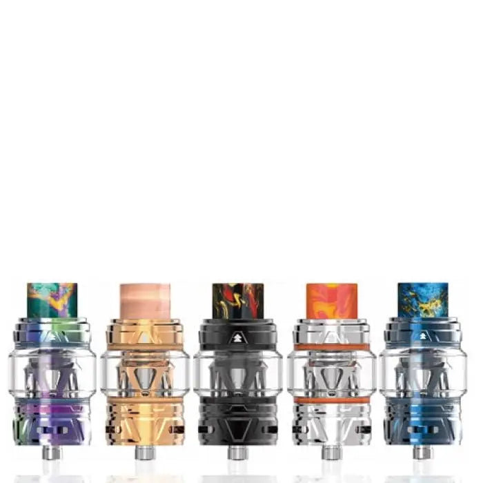 Collection of colorful vaping tanks or atomizers with glass and metal components.