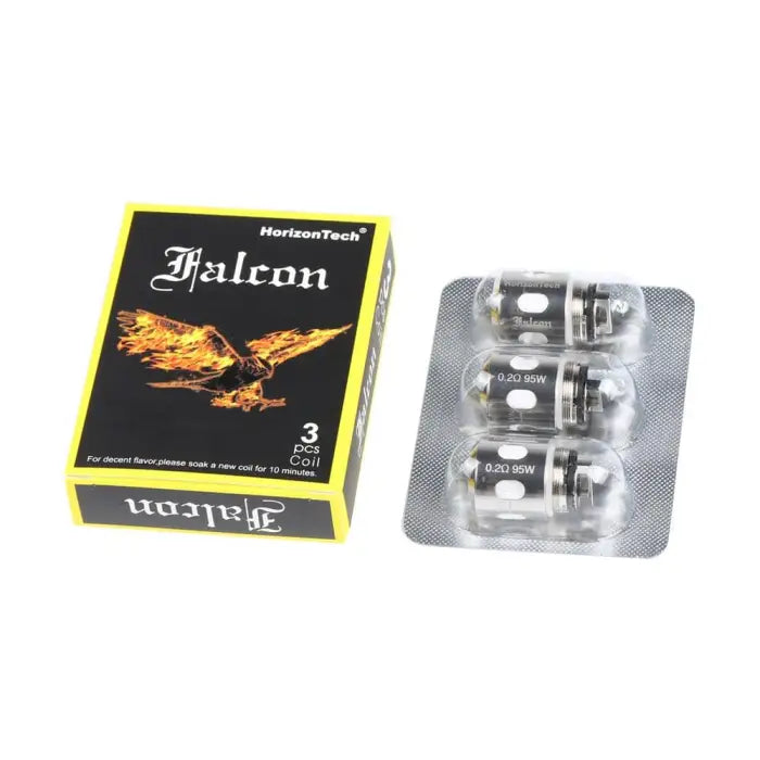 Replacement coils for an electronic vaping device, with a product box labeled ’Falcon’ beside them.