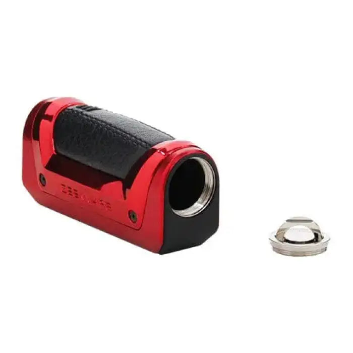 Red and black handheld digital video camera with a detached lens cap.