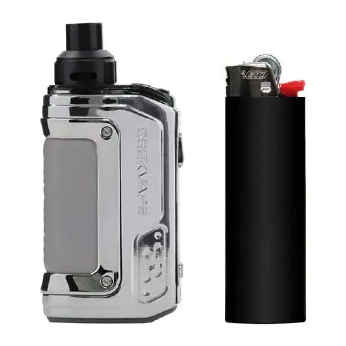 Electronic vaping device with a metallic body and black components, shown next to a black lighter for size comparison.