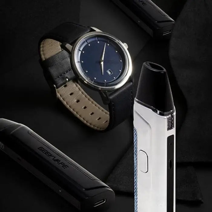 Sleek wristwatch with a dark blue dial and gray leather strap.