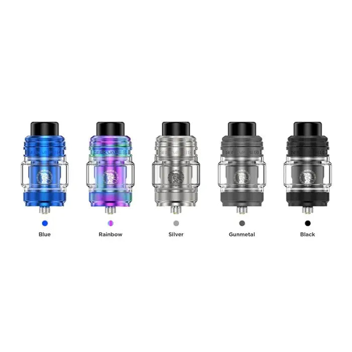 Five vaping tanks or atomizers in different colors: blue, rainbow, silver, gunmetal, and black.