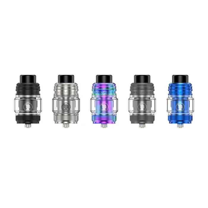 Row of five vaping tanks or atomizers in different colors and finishes.