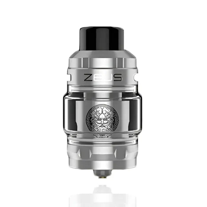 Metallic vaping tank or atomizer with ’ZEUS’ branding and a decorative emblem.