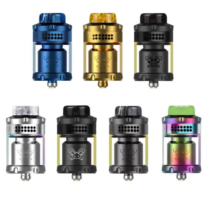 Collection of colorful vaping atomizers or tanks in various metallic finishes.