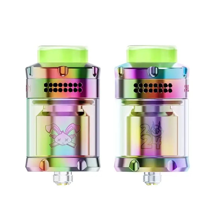 Iridescent metal vaping tanks with green tops and cartoon rabbit designs.