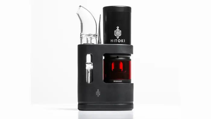 Electronic vaporizer device with a black body and red illuminated display.