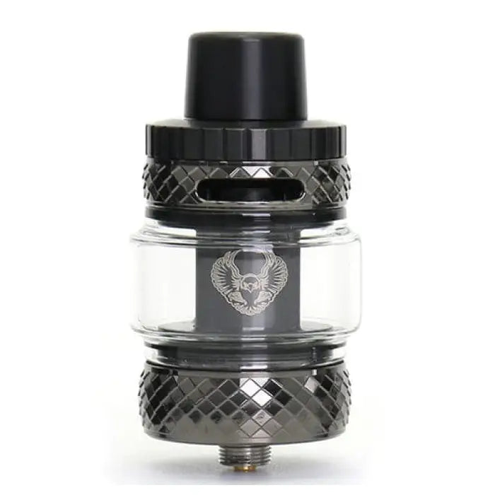 Vaping tank or atomizer with a glass section and metal components featuring a skull logo.