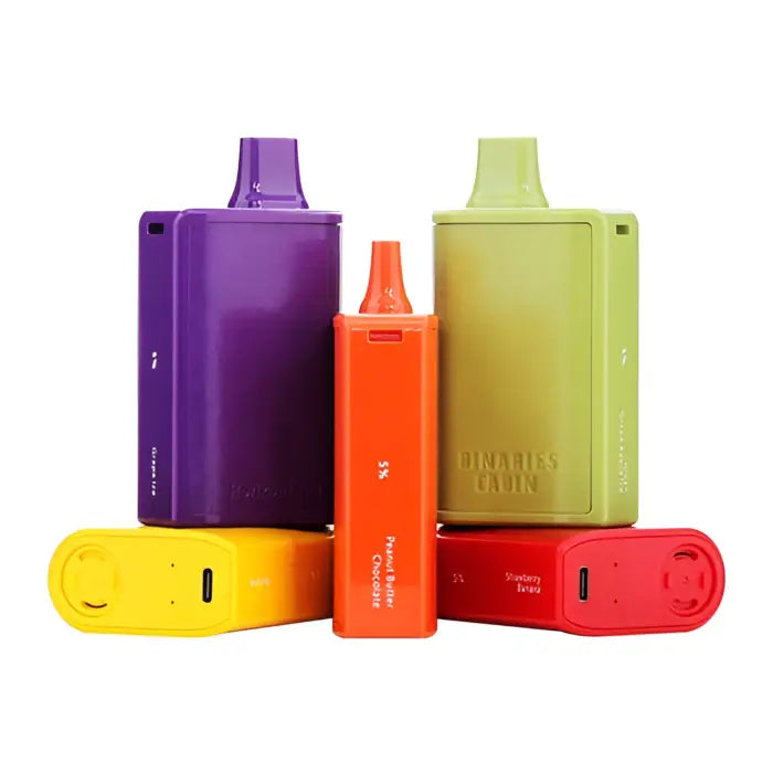 Colorful collection of electronic vaping devices or e-cigarettes in various shapes and sizes.