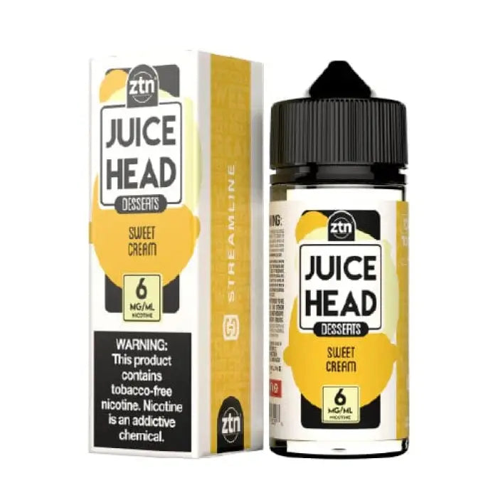 Bottle of ’Juice Head’ e-liquid in Sweet Cream flavor with its packaging box.