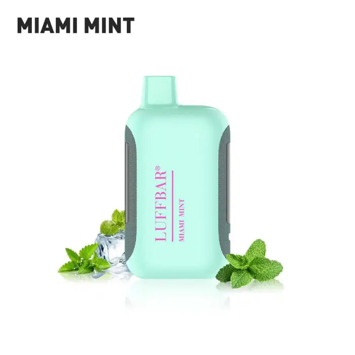 Mint green bottle labeled ’Miami Mint’ with fresh mint leaves beside it.