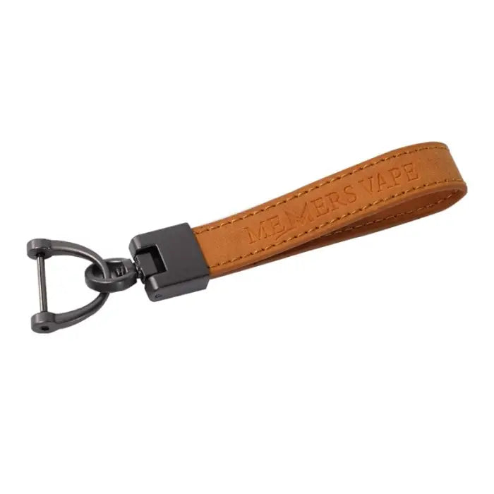 Leather keychain or strap with a metal clip attachment.