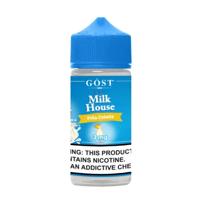 Blue and white bottle labeled ’GQST Milk House’ with a warning about nicotine content.