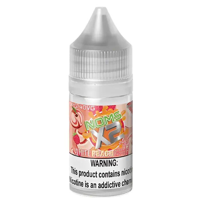 Bottle of e-liquid labeled ’Noms X2 White Peach Pear’ with a warning about nicotine content.