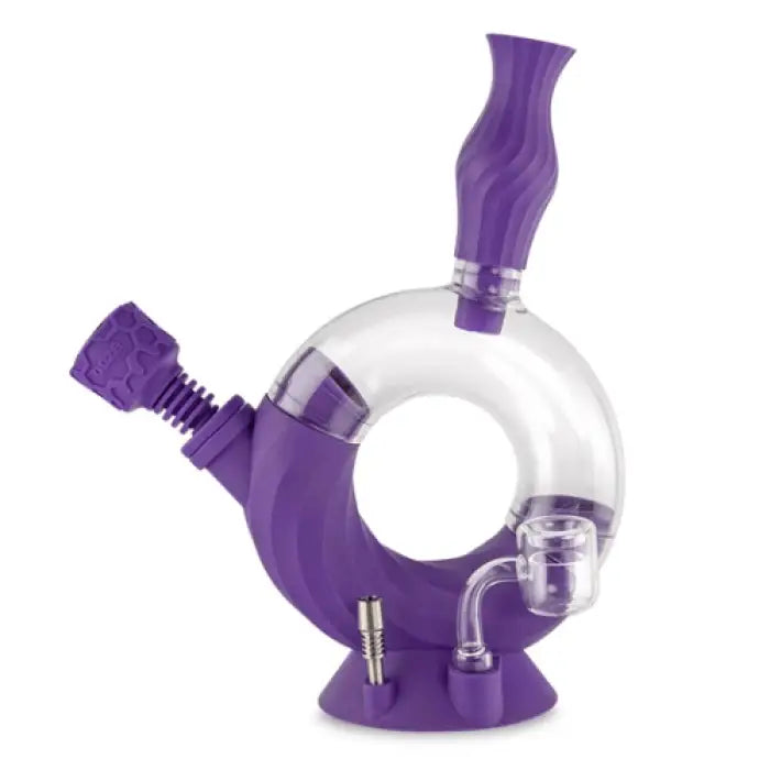 Uniquely shaped purple and clear glass water pipe with multiple stems.