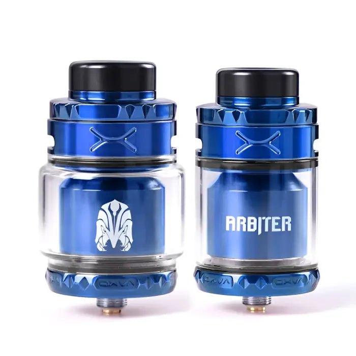 Two blue and silver vaping tanks or atomizers with black tops.