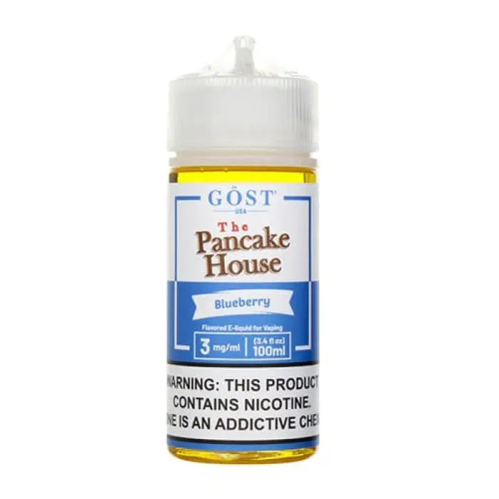 Bottle of e-liquid labeled ’The Pancake House Blueberry’ with a nicotine warning.