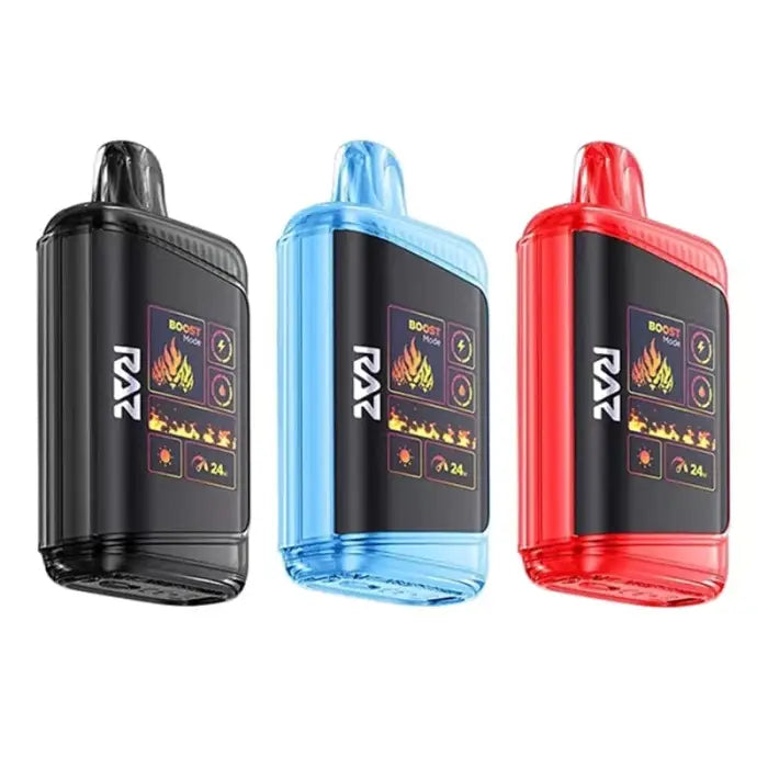 Three vaporizer devices in black, blue, and red colors with digital displays.