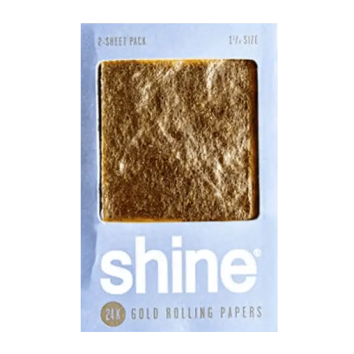 Gold-colored rolling paper in a light blue packaging labeled ’shine’.