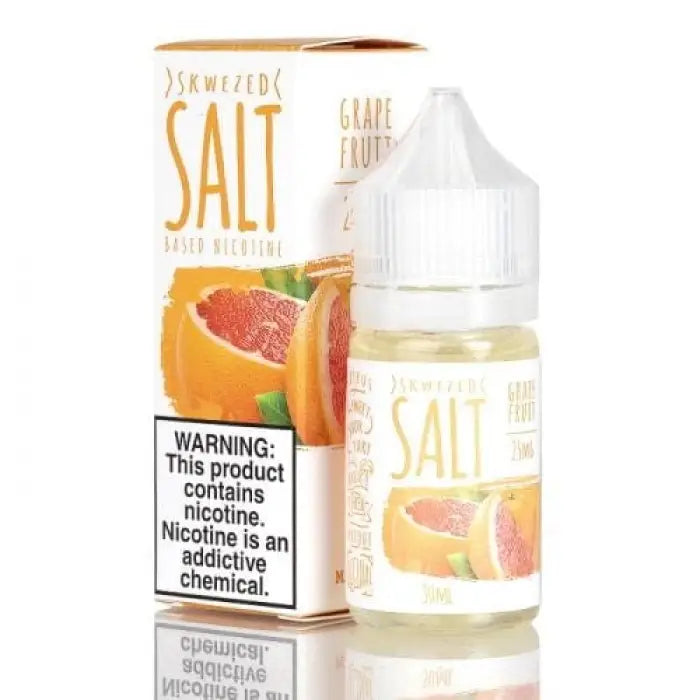 Bottle of grapefruit-flavored nicotine salt e-liquid with its packaging.