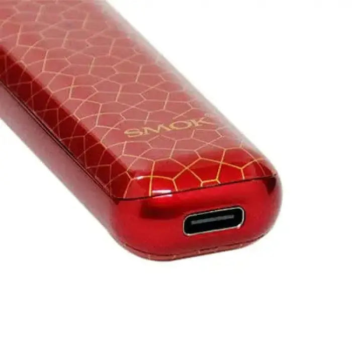 Red electronic cigarette or vape device with a geometric pattern design and USB charging port.