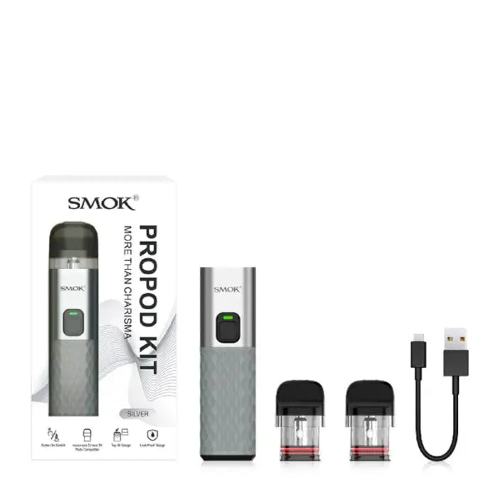 Electronic cigarette or vaping device kit with pods and charging cable.