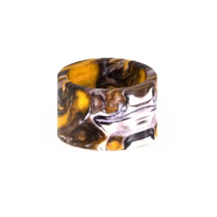 Cylindrical bead with swirled yellow, brown, and silver patterns.