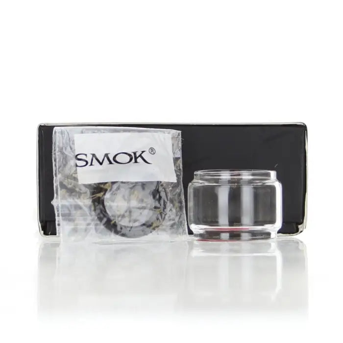 Glass tube or tank for an electronic cigarette or vaping device, with SMOK branding visible on packaging.