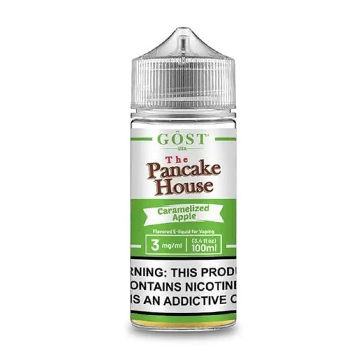 Bottle of e-liquid labeled ’GOST The Pancake House Caramelized Apple’ with a warning about nicotine content.