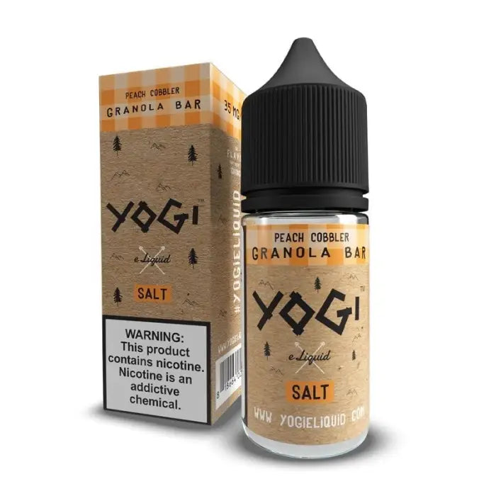 Bottle of Yogi brand peach cobbler granola bar flavored e-liquid with its packaging.